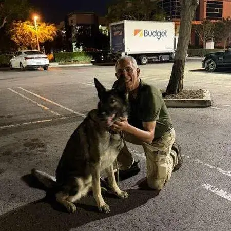 U.S. service member with his dog before a PCS move to Okinawa, Japan with Across The Pond Pets
